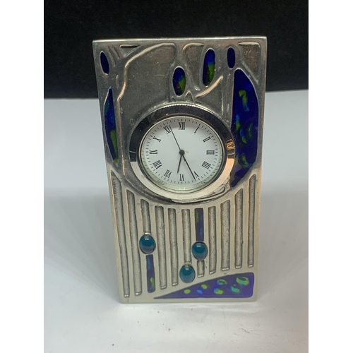 620 - A SMALL CHARLES RENNIE MACINTOSH MANTLE CLOCK