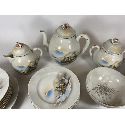 417 - A VINTAGE LARGE JAPANESE EGGSHELL PORCELAIN TEA SET WITH LANDSCAPE DESIGN, TEAPOT HEIGHT 18CM