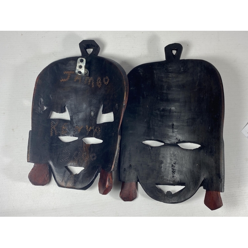 432 - A PAIR OF VINTAGE AFRICAN TRIBAL MASKS, LENGTH 23CM