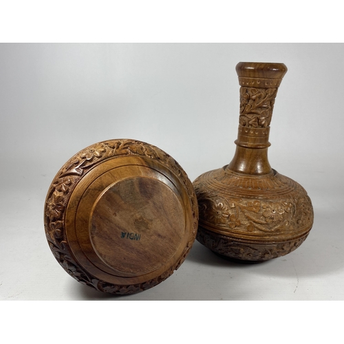 436 - A PAIR OF VINTAGE CARVED MIDDLE EASTERN WOODEN VASES, HEIGHT 23CM