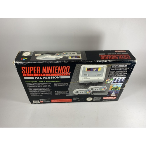 302 - A BOXED RETRO SUPER NINTENDO PAL VERSION ENTERTAINMENT SYSTEM CONSOLE - SUPER MARIO WORLD VERSION