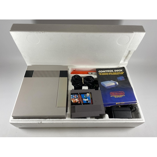 305 - A BOXED RETRO NINTENDO ACTION SET NES VERSION ENTERTAINMENT SYSTEM CONSOLE