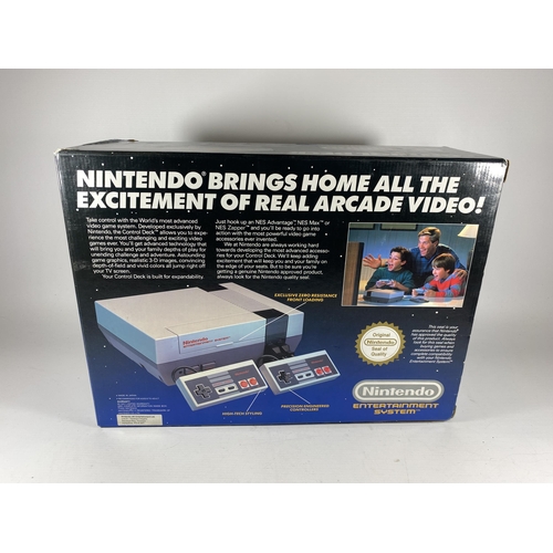 310 - A BOXED RETRO NINTENDO CONTROL DECK NES VERSION SUPER MARIO 3 ENTERTAINMENT SYSTEM CONSOLE