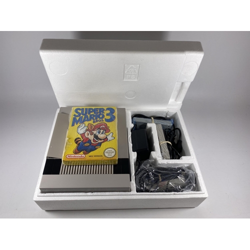 310 - A BOXED RETRO NINTENDO CONTROL DECK NES VERSION SUPER MARIO 3 ENTERTAINMENT SYSTEM CONSOLE