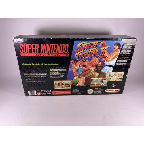 311 - A BOXED RETRO SUPER NINTENDO STREET FIGHTER II ENTERTAINMENT SYSTEM CONSOLE