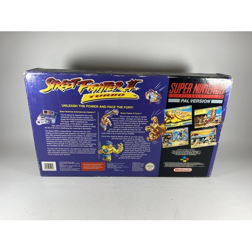 312 - A BOXED RETRO SUPER NINTENDO ENTERTAINMENT SYSTEM STREET FIGHTER II TURBO PAL VERSION CONSOLE