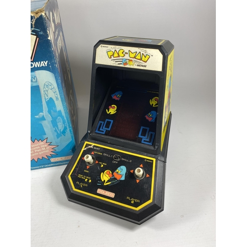 322 - A BOXED RETRO COLECO PAC MAN BY MIDWAY ARCADE GAME