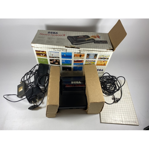 323 - A BOXED RETRO SEGA MASTER SYSTEM II GAMING CONSOLE