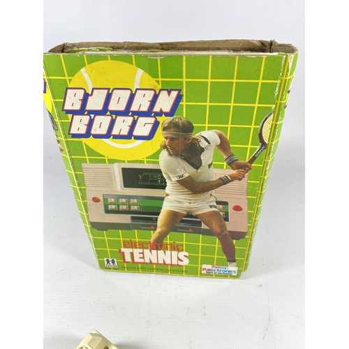 344 - A BOXED RETRO BJORN BORG ELECTRONIC TENNIS GAME