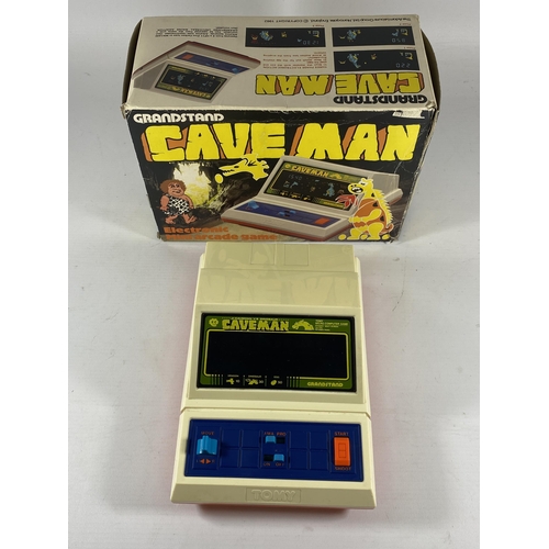 416 - A RETRO BOXED GRANDSTAND CAVE MAN ELECTRONIC MINI ARCADE GAME