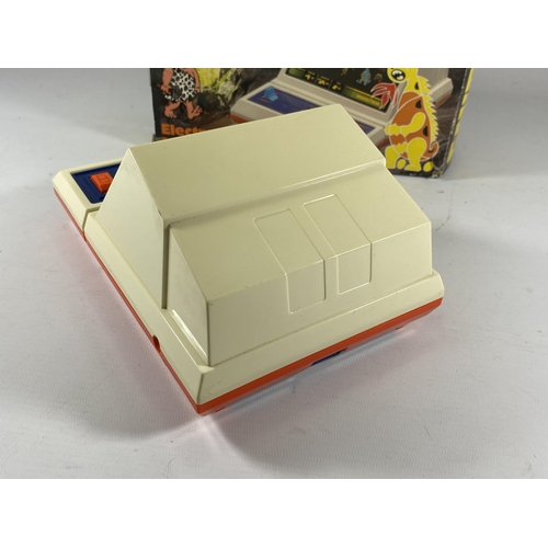 416 - A RETRO BOXED GRANDSTAND CAVE MAN ELECTRONIC MINI ARCADE GAME