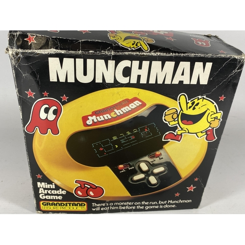 417 - A RETRO BOXED GRANDSTAND MUNCHMAN MINI ARCADE GAME