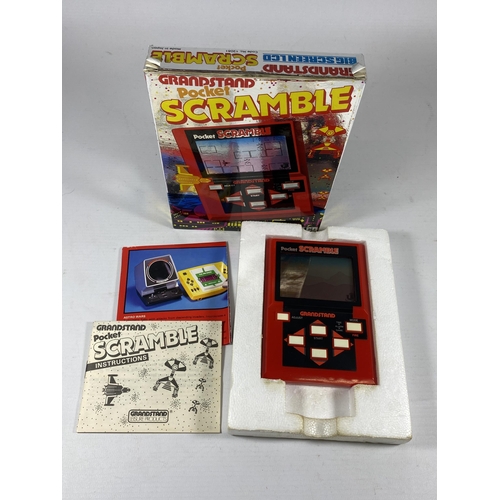 425 - A RETRO BOXED GRANDSTAND POCKET SCRAMBLE ARCADE GAME