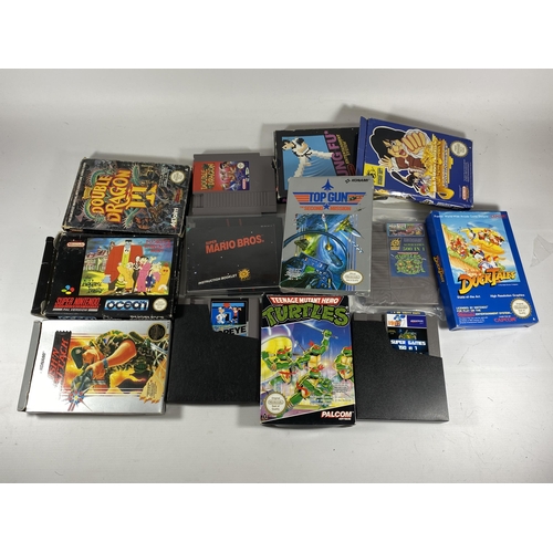 429 - A GROUP OF RETRO NINTENDO GAMES, TEENAGE MUTANT NINJA TURTLES, TOP GUN ETC