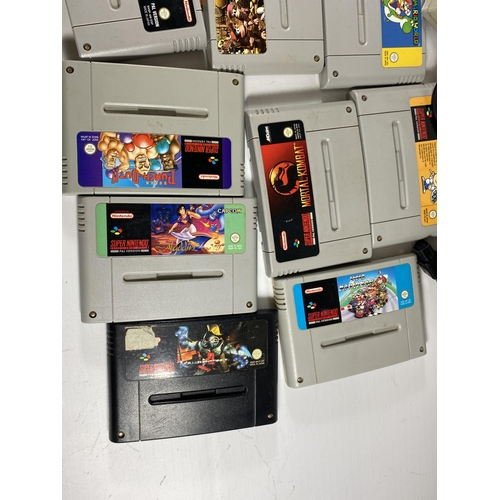 431 - A GROUP OF RETRO SUPER NINTENDO GAMES, SUPER MARIO WORLD, CONTROLLERS ETC