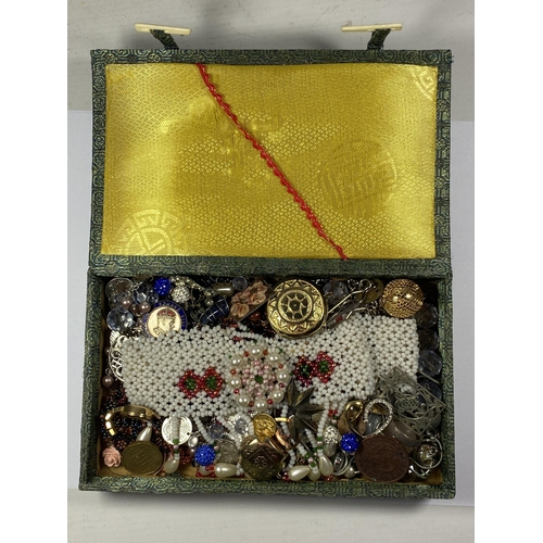 647 - A MIXED LOT OF COSTUME JEWELLERY IN ORIENTAL SILK TYPE BOX