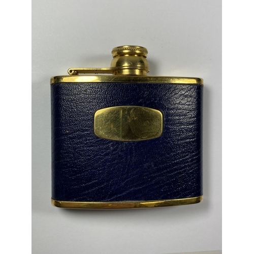 658 - A VINTAGE GOLD PLATED AND BLUE LEATHER HIP FLASK