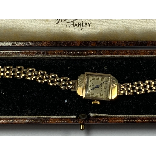 509 - A VINTAGE CASED MARVIN LADIES 9CT YELLOW GOLD CASE & STRAP WATCH, GROSS WEIGHT 14.46G