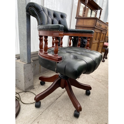 2512 - A GREEN BUTTON-BACK SWIVEL DESK CHAIR WITH TURNED UPRIGHTS