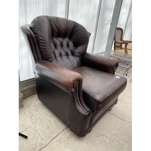 2543 - A PENDRAGON BROWN LEATHER BUTTON-BACK ROCKING EASY CHAIR