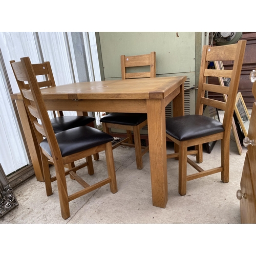 2550 - AN OAK EXTENDING DINING TABLE, 47X32