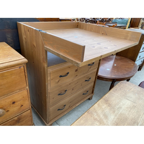 2553 - A PINE NURSERY CHEST OF THREE DRAWERS WITH FOLD-OVER TOP, 31.5