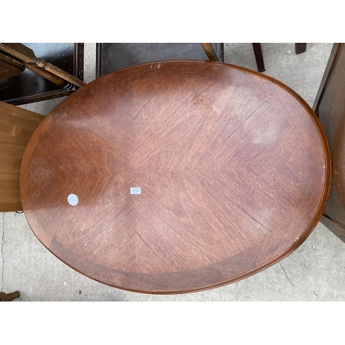 2554 - AN OVAL COFFEE TABLE