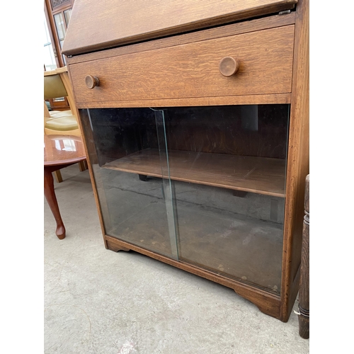 2561 - A MID 20TH CENTURY OAK BUREAU, 30