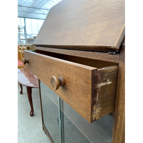 2561 - A MID 20TH CENTURY OAK BUREAU, 30