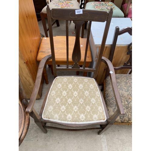 2567 - AN EDWARDIAN MAHOGANY AND INLAID ELBOW CHAIR, TWO EDWARDIAN NURSING CHAIR AND DINING CHAIR