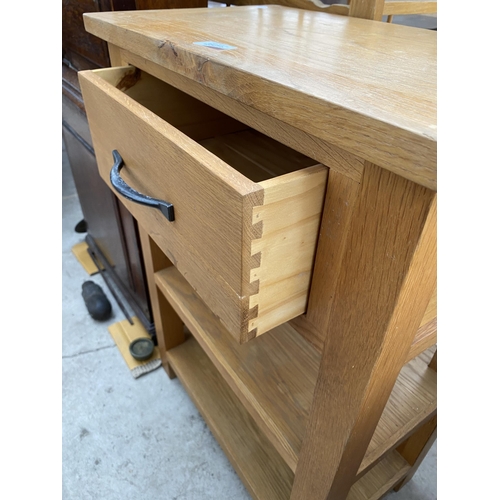 2573 - A MODERN OAK 'MORE OR LESS' BEDSIDE TABLE