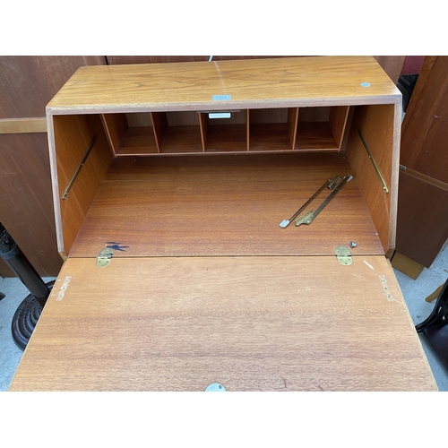 2581 - A RETRO TEAK BUREAU WITH THREE DRAWERS TO THE BASE, 30