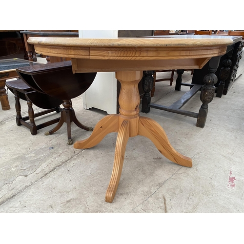 2636 - A PINE PEDESTAL DINING TABLE - 42