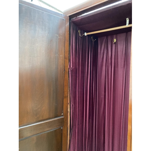 2643 - A VICTORIAN WALNUT DOUBLE MIRROR-DOOR WARDROBE WITH GLASS CENTRE PANELS AND TWO DRAWERS TO THE BASE,... 