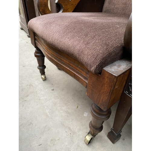 2649 - A VICTORIAN MAHOGANY OPEN FIRESIDE CHAIR ON TURNED FRONT LEGS