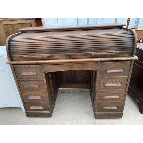 2687 - AN EARLY 20TH CENTURY OAK TWIN PEDESTAL ROLL TOP DESK ENCLOSING SEVEN DRAWERS AND TWO SLIDES, 48