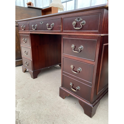 2688 - A MAHOGANY TWIN-PEDESTAL DESK WITH INSET LEATHER TOP AND EIGHT DRAWERS, 48 X 24