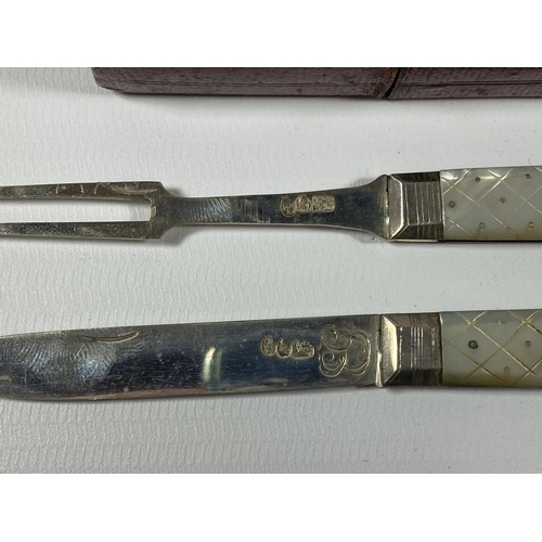 690 - A LEATHER CASED MOTHER OF PEARL AND GEORGIAN HALLMARKED SILVER FRUIT KNIFE AND FORK