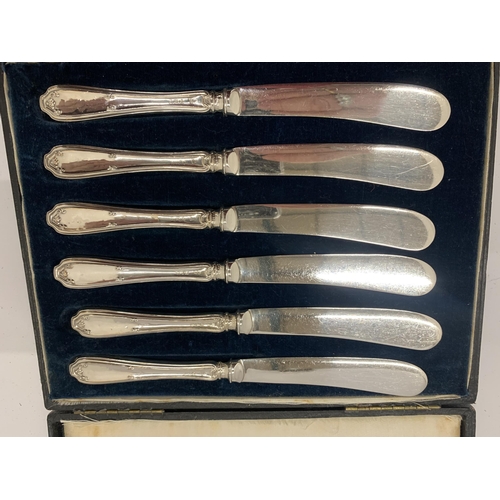 20 - A CASED SET OF SIX HALLMARKED SILVER HANDLED BUTTER KNIVES