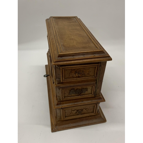 25 - A CARVED SATINWOOD TABLE TOP SEWING CABINET WITH LIFT UP LID AND INNER DRAWERS, HEIGHT 17CM