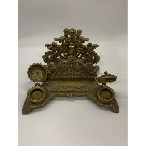 35 - A DECORATIVE BRASS INKSTAND