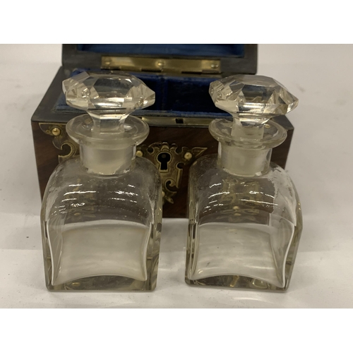 59 - A SMALL 19TH CENTURY MAHOGANY AND BRASS TWIN BOTTLE CADDY