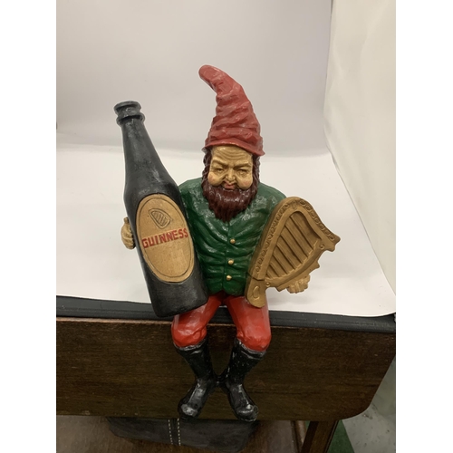 61 - A WOODEN GUINNESS LEPRACHAUN FIGURE, HEIGHT 37CM