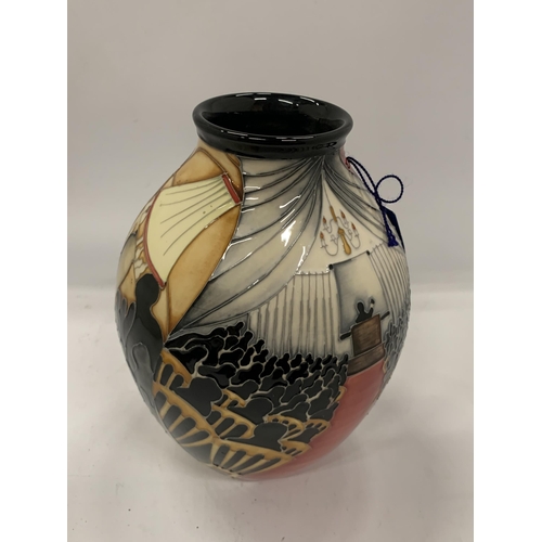 63 - A LIMITED EDITION MOORCROFT 'OPEN DAY' PATTERN VASE, NO.14/15, HEIGHT 21CM