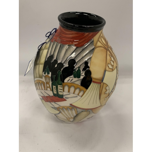 63 - A LIMITED EDITION MOORCROFT 'OPEN DAY' PATTERN VASE, NO.14/15, HEIGHT 21CM