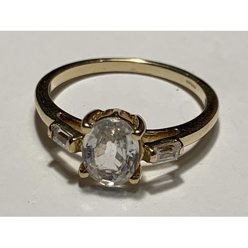 676 - A 9 CARAT GOLD RING WITH A WHITE SAPPHIRE SIZE N/O