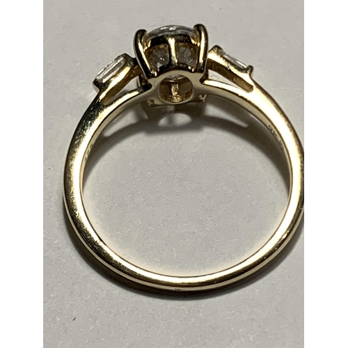 676 - A 9 CARAT GOLD RING WITH A WHITE SAPPHIRE SIZE N/O