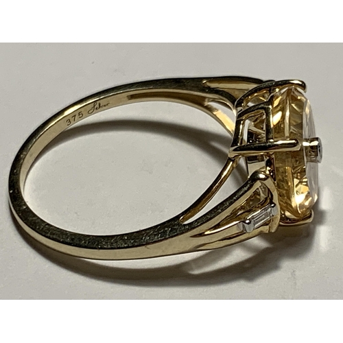 680 - A 9 CARAT GOLD RING WITH THREE DIAMONDS SIZE O