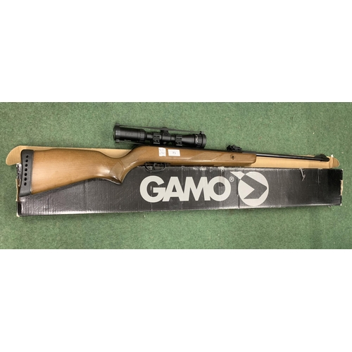 73 - A GAMO HUNTER 440 .22 AIR RIFLE WITH SCOPE AND PELLET TINS