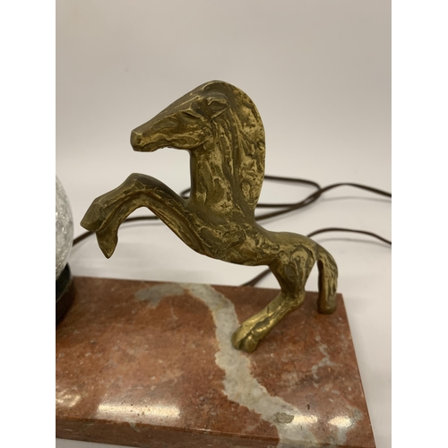 83 - AN ART DECO MARBLE LAMP WITH BRASS HORSE DESIGN, LENGTH 23CM